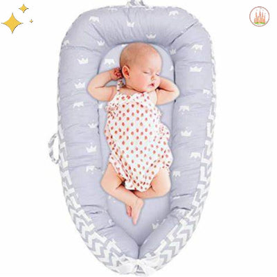 lit enfant avec reducteur couronne blanche