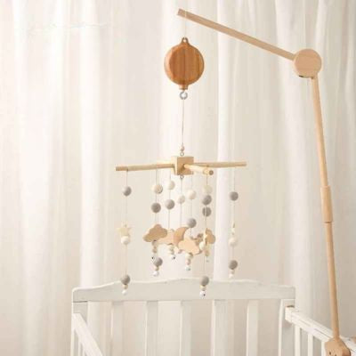 Support bois mobile lit de bébé design unique