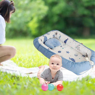 cocon pour bebe bleu océan en parc