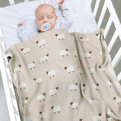couverture bébé tricot cocon de moutons sommeil paisible