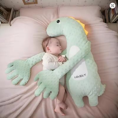 doudou bébé main apaisante pour bébé dinosaure vert