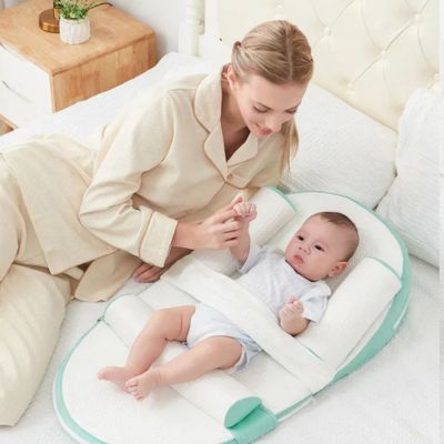réducteur de lit bébé coussin anti-régurgitation vert moments doux