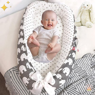 réducteur de lit bébé éléphant blanc