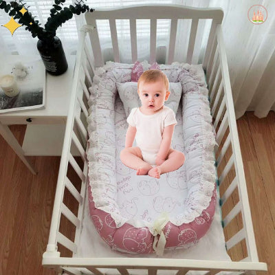 réducteur de lit éléphant rose