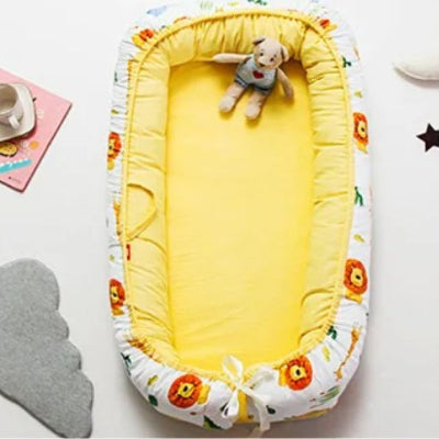 réducteur de lit bebe lion nid doux