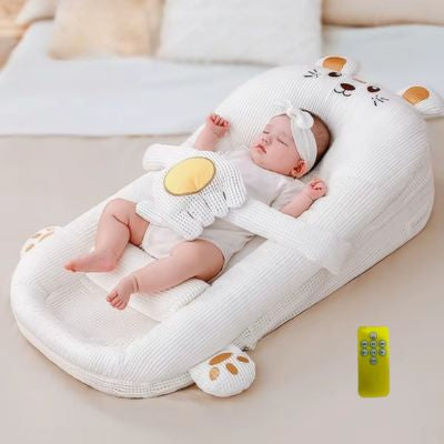 réducteur de lit bébé main apaisante anti-coliques ourson